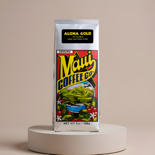 A 7oz (198g) bag of Aloha Gold Coffee is displayed on a round pedestal. The vibrant packaging showcases tropical artwork, coffee cherries, and a mountain scene evocative of the Ka’u Coffee region.