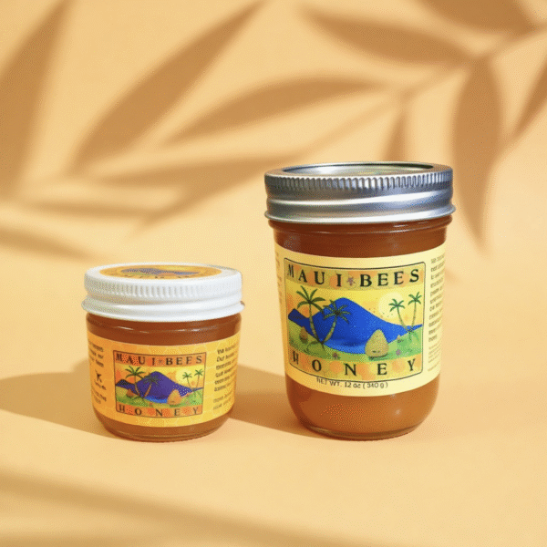 Two jars of Maui Wildflower Summer Honey sit on a peach background with palm leaf shadows. The jars have yellow labels featuring a beach scene with mountains and palm trees.