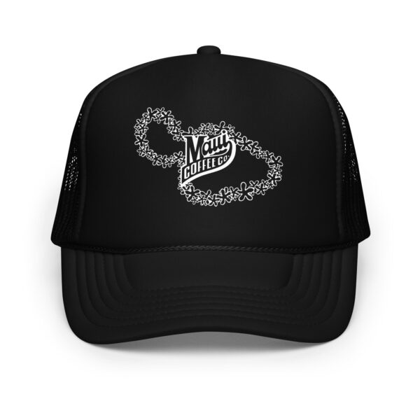 A black and white foam trucker hat featuring a white lei graphic of Hawaiian islands made from small flowers and “Maui Coffee Co.” text in the center, with a breathable mesh back.