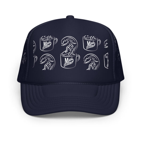 White Surfer Foam Trucker Hat: This navy blue foam trucker hat features white line art of a surfer riding a wave inside a coffee cup, with “Maui Coffee Co.” repeated in a grid pattern across the front.