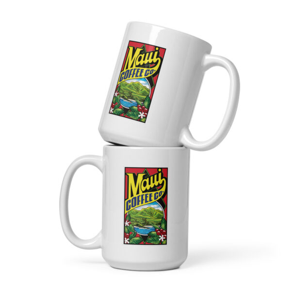 Two Logo White Mugs are stacked, each showcasing a colorful rectangular Maui Coffee Co logo with tropical plants, a mountain, and vibrant yellow lettering.